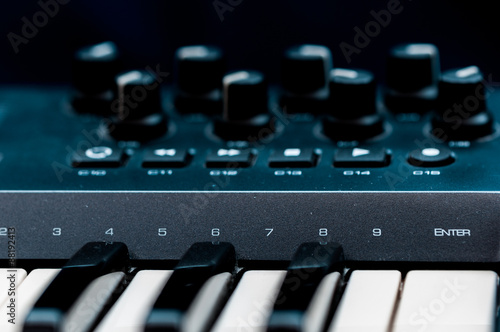 piano keys. close-up frontal view of keyboard