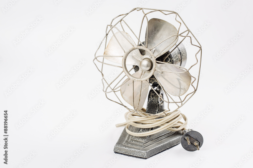 Obraz premium old vintage metal fan isolated on white