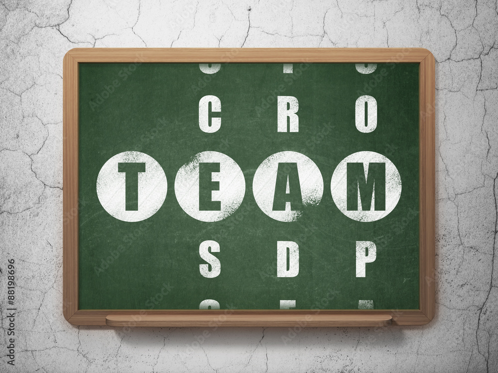 Obraz premium Business concept: word Team in solving Crossword Puzzle