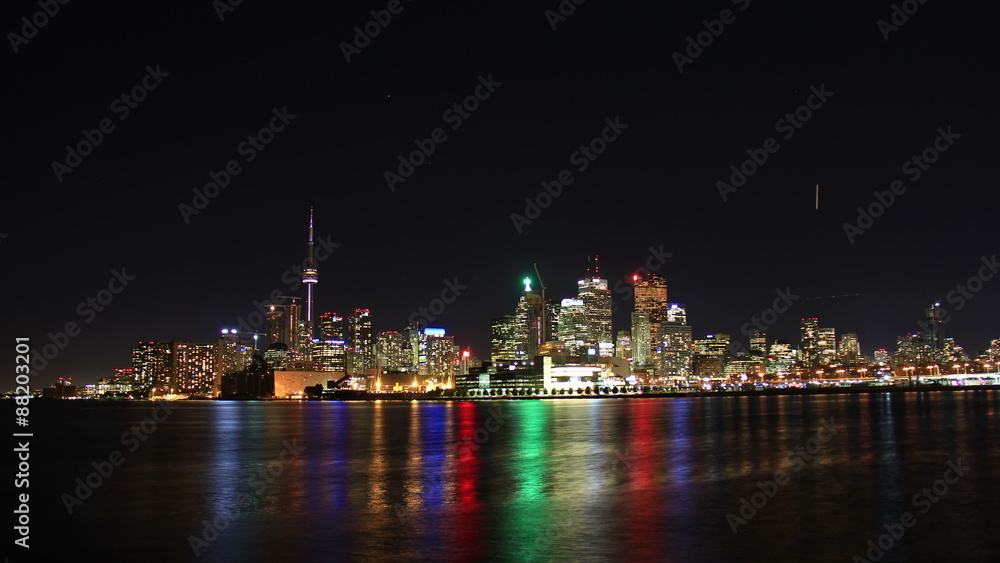Toronto Night Skyline Timelapse 1. Toronto, Canada as seen from across the harbor at night, shot in long exposure time lapse. Rendered in 4K from high resolution still photographs. Toronto Night Skyline Timelapse 1. Toronto, Canada as seen from across the harbor at night, shot in long exposure time lapse. Rendered in 4K from high resolution still photographs.