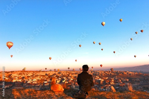  The relationship with a man and a dog  to see hotair balloon in Cappadocia TURKEY  photo