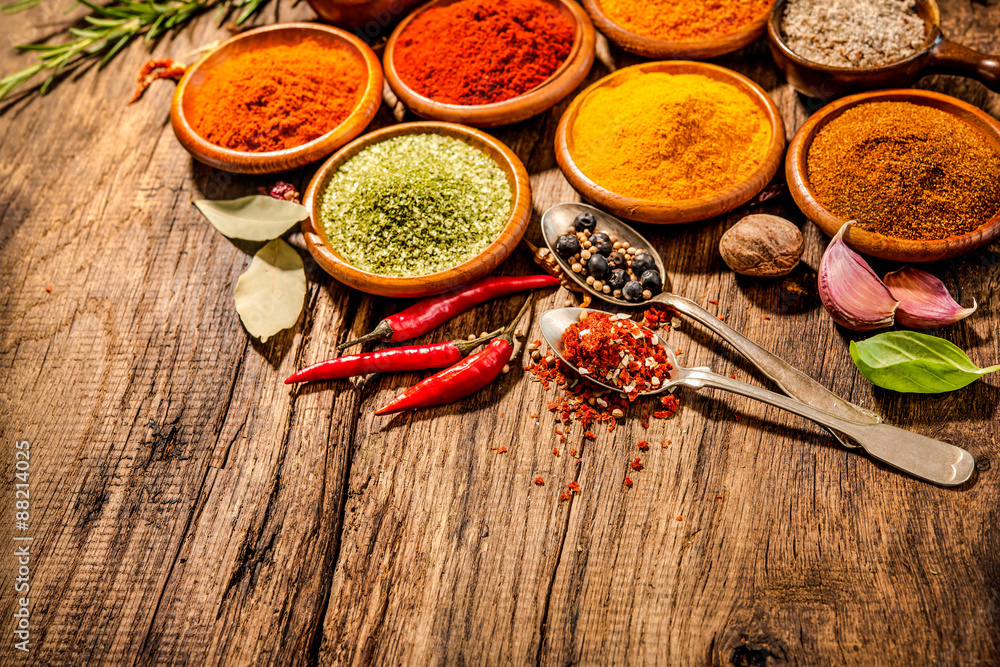Herbs and spices on wooden table Herbs and spices on wooden table