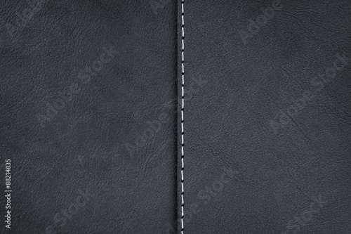Black leather texture with seam photo