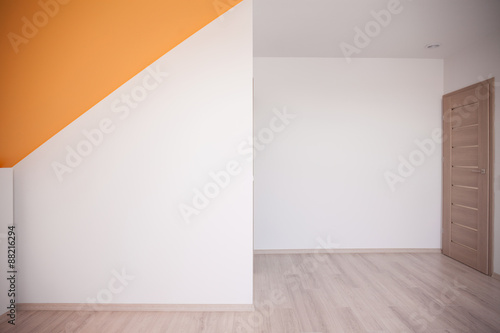 Loft with orange color accent