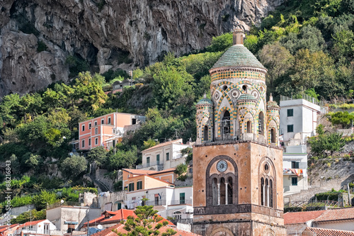 Close up of bell tower, Amalfi Cathedral, {Cattedrale di Sant'Andrea/Duomo di Amalfi). dating back to 9th century. Dome is covered with typical green majolica tiles.