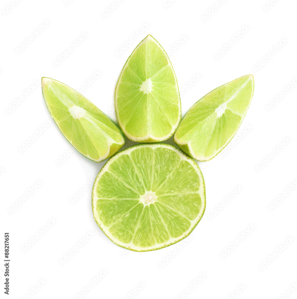 Served lime fruit composition isolated over the white background