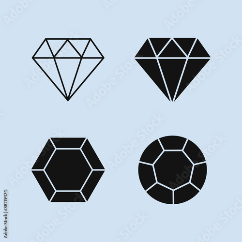 Set of faceted black diamond icons. Isolated on light blue background. Vector illustration.
