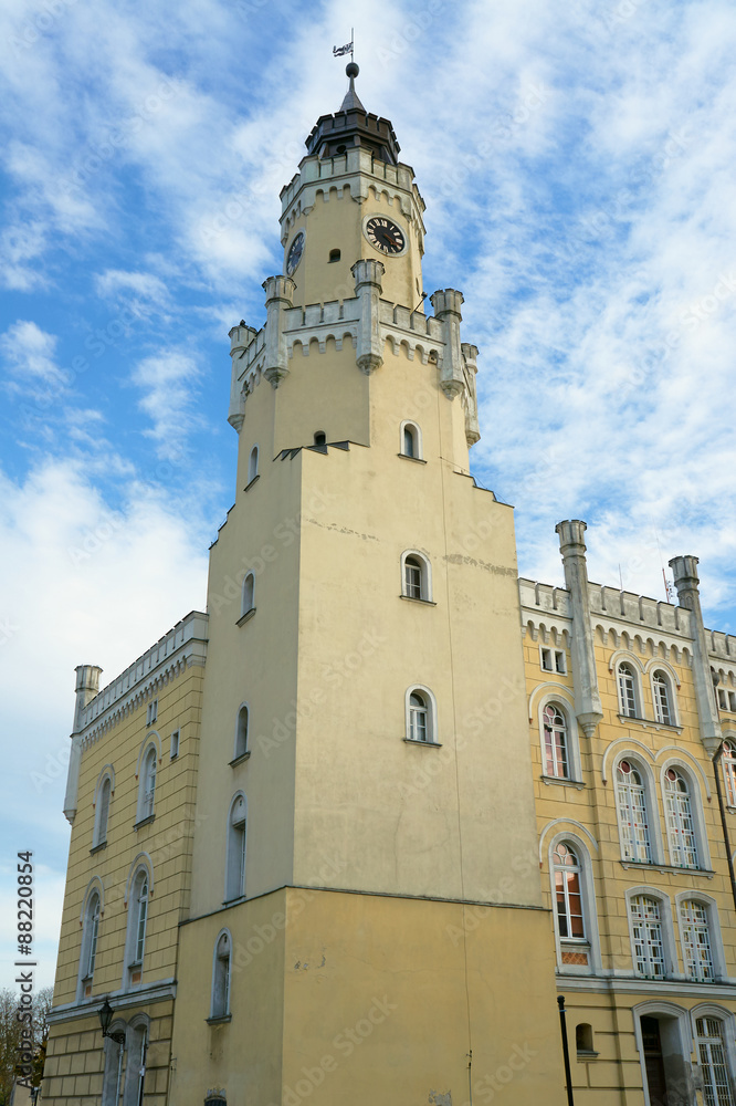 City Hall with clock tower in Wschowa, Poland.