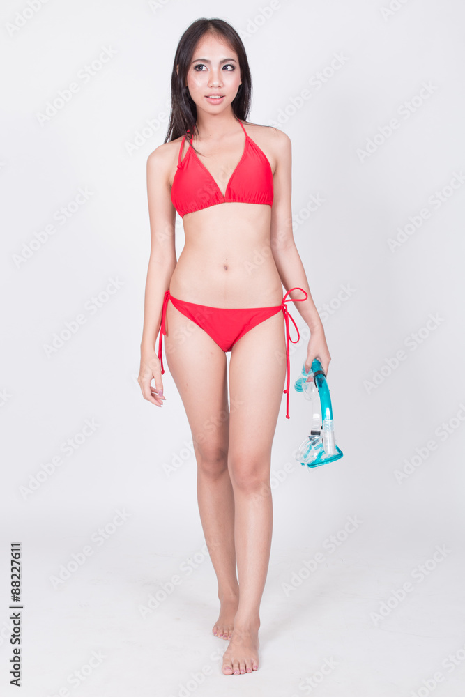 Sexy Asian girl in red bikini with snorkle Stock Photo | Adobe Stock