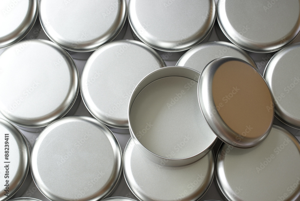 Many round tin boxes from top view Many round tin boxes from top view