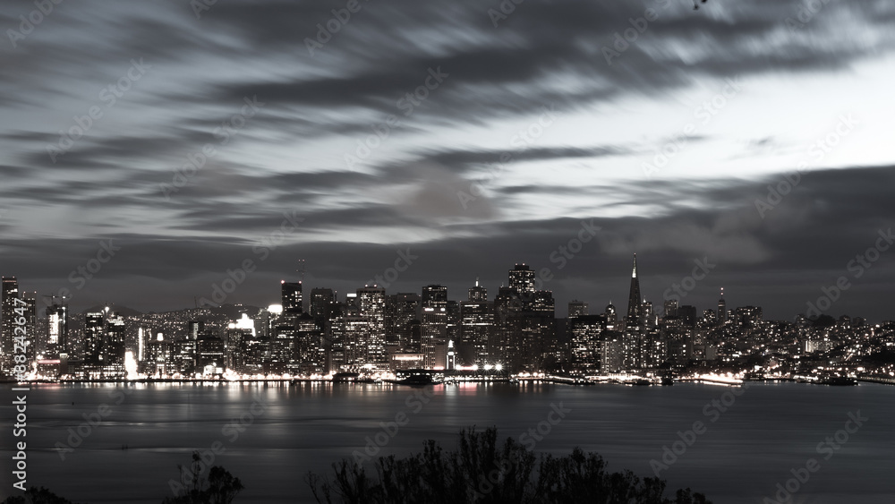 San Francisco Bay Bridge and skyline at night black and white