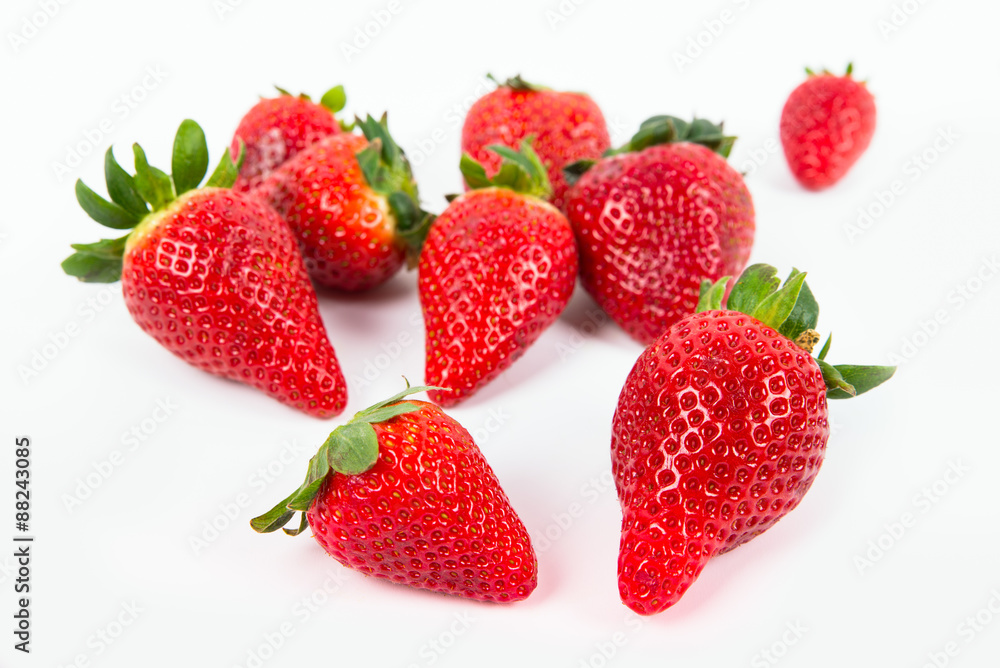 a group of shiny ripe strawberries a group of shiny ripe strawberries
