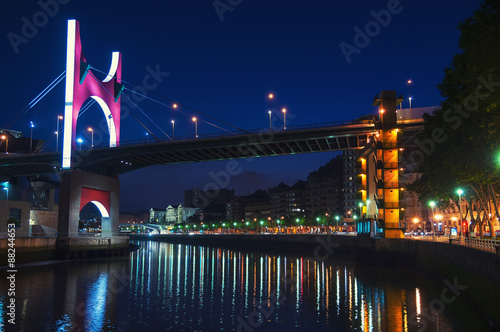 Salbeko zubia Bridge over Nevion River in Bilbao, Spain at night photo