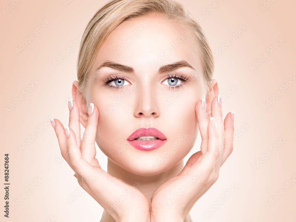Beautiful spa girl touching her face. Perfect fresh skin Beautiful spa girl touching her face. Perfect fresh skin
