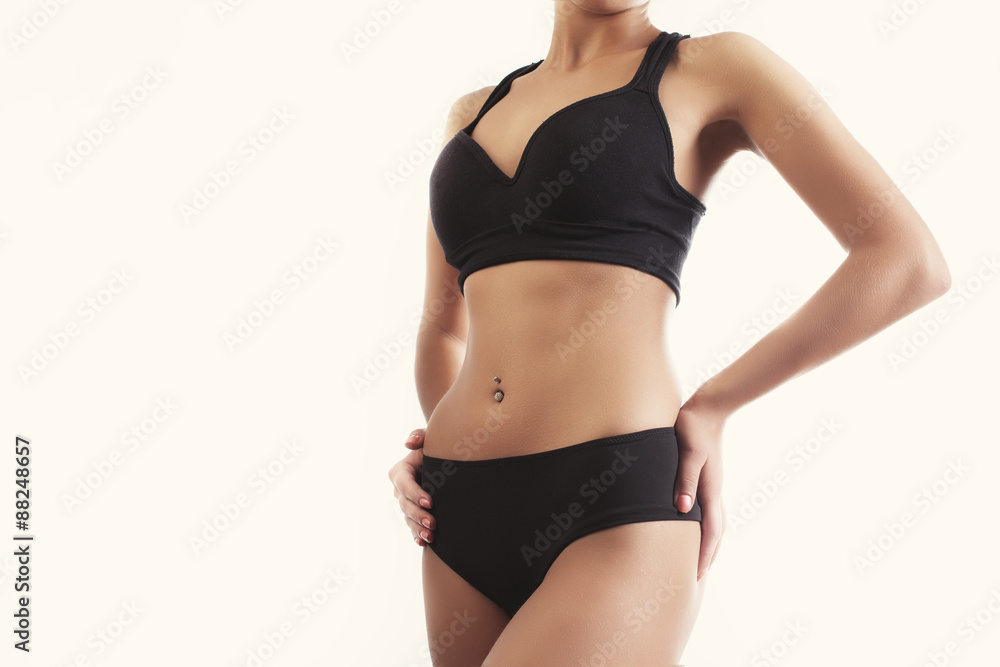 Close-up image of fitness female model in sportswear Close-up image of fitness female model in sportswear