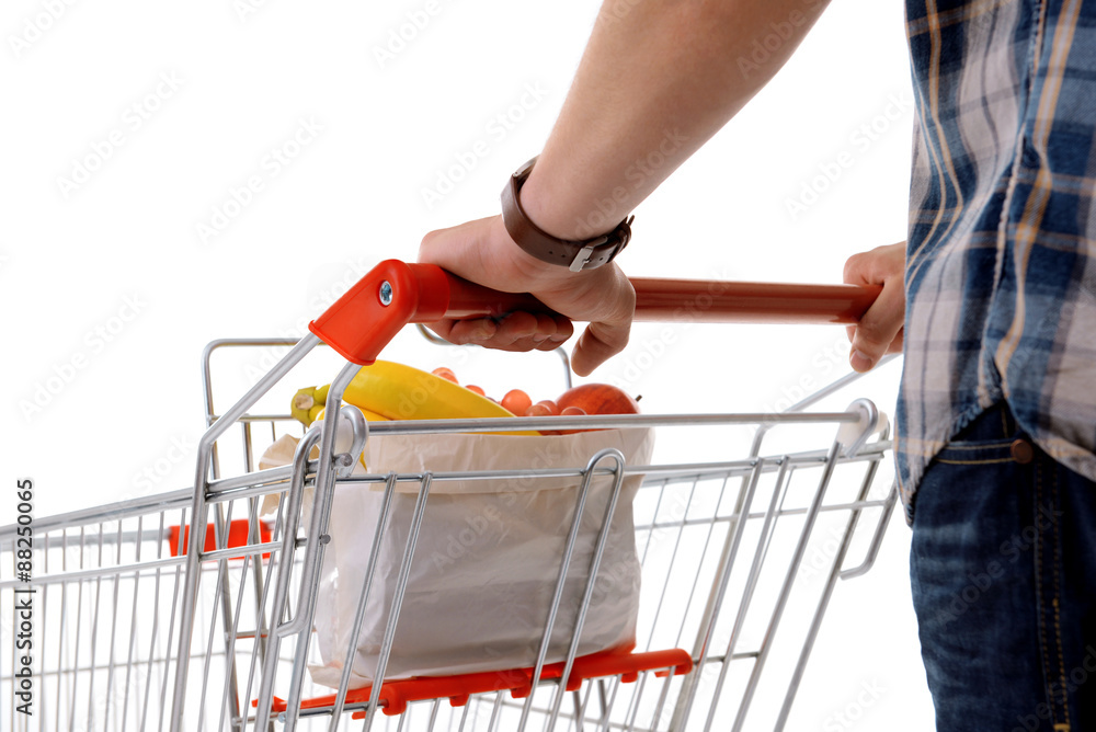 Young man with shopping cart close up