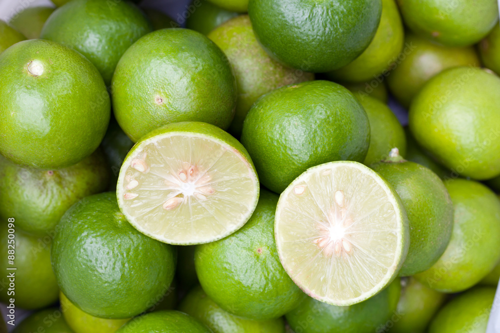Close up fresh green lemon the top. Close up fresh green lemon the top.