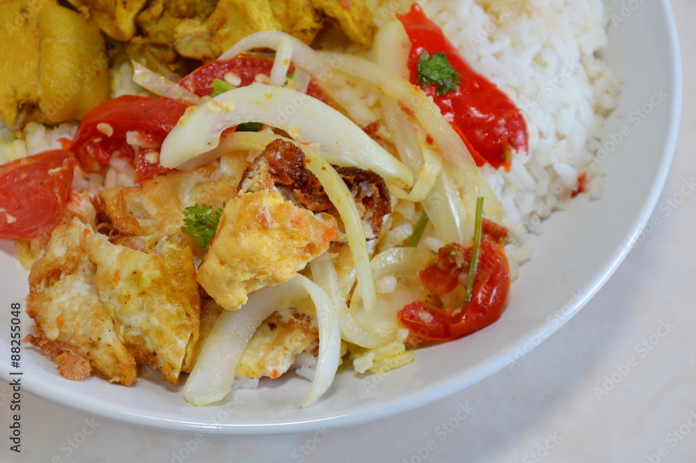 spicy salad with fried egg on rice spicy salad with fried egg on rice