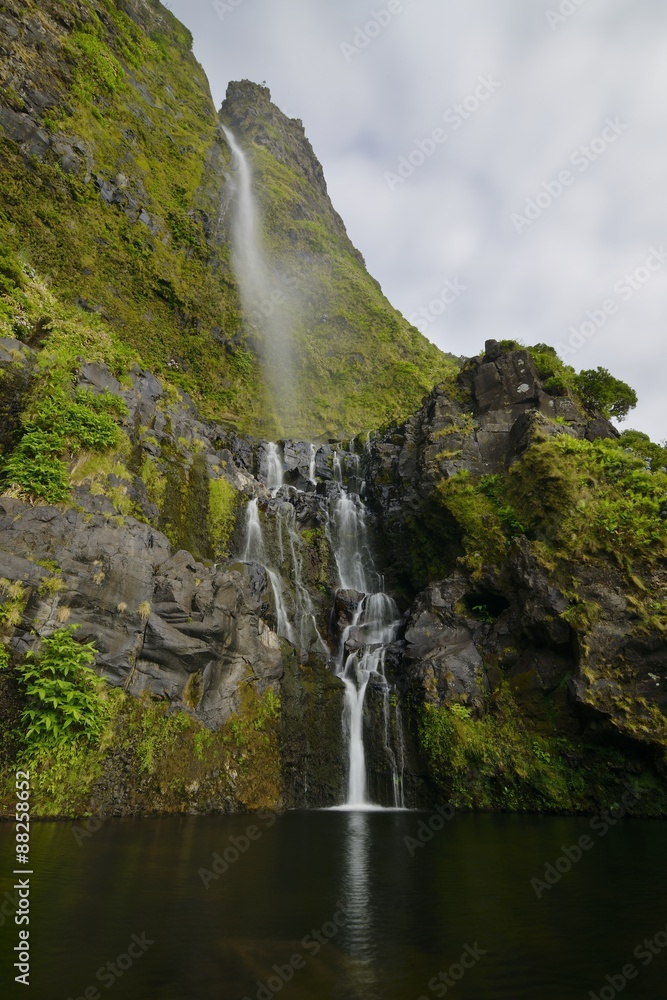 Obraz premium Poço do Bacalhau waterfall, Fajã Grande, Flores island, Azores, Portugal