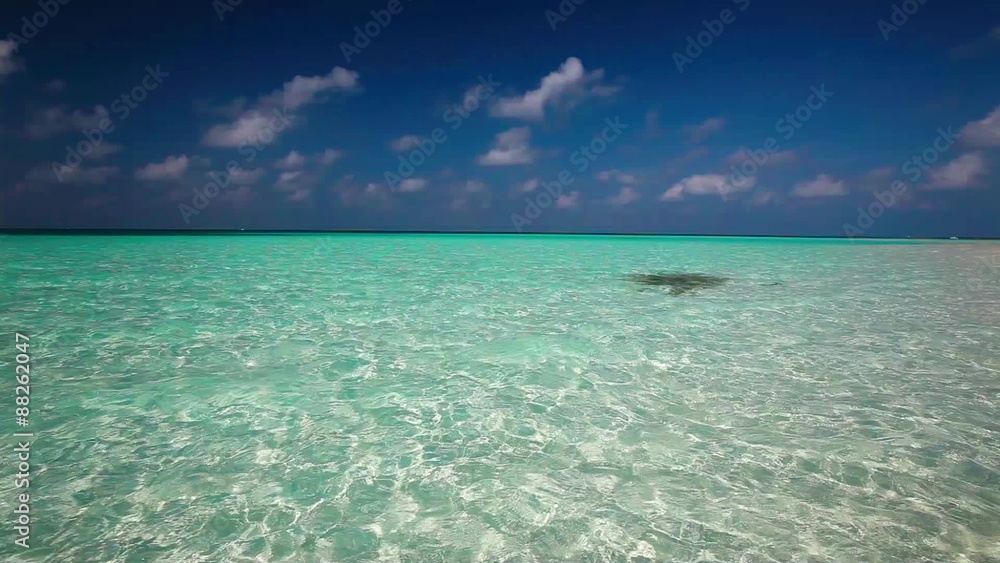 Clean turquise lagoon on a tropical island with waves
Clean turquise lagoon on a tropical island with waves