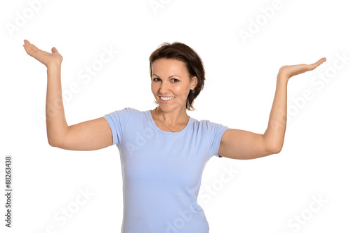 Brunette woman holding copy space