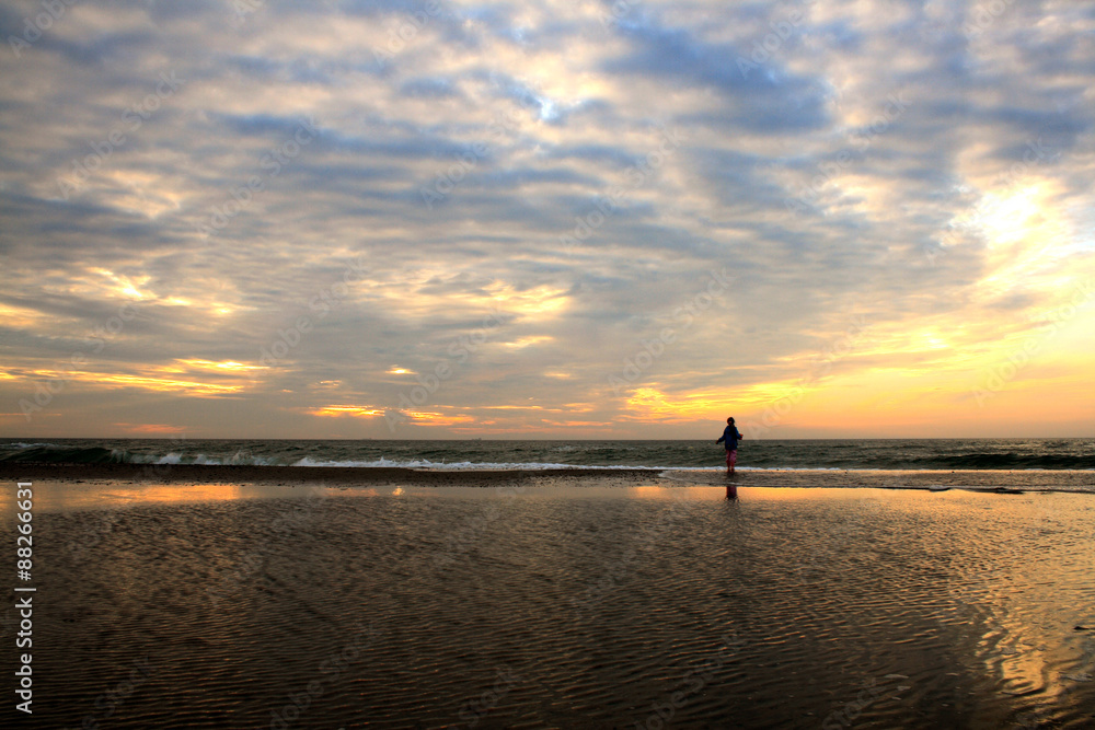 Small unrecognizable person at the beach Small unrecognizable person at the beach