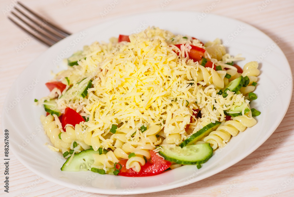 pasta salad with cheese, tomato and cucumber pasta salad with cheese, tomato and cucumber
