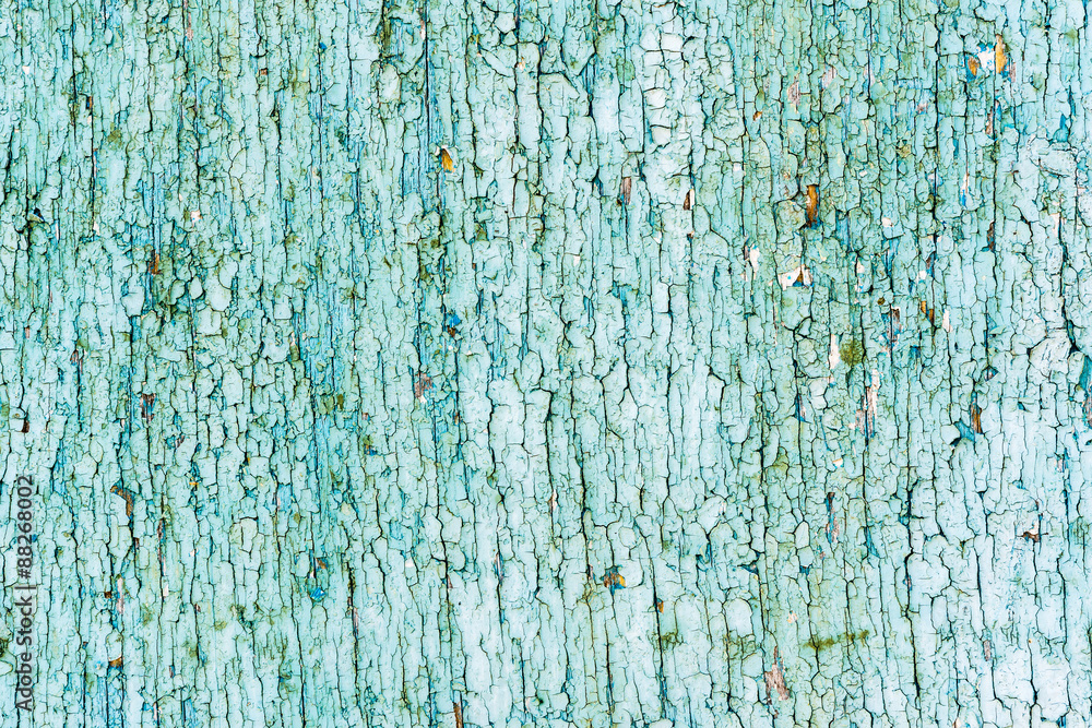 Obraz premium Wooden wall with cracked paint