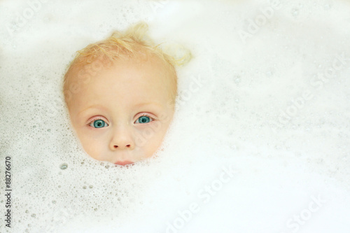 Baby Boy Face Peeking Out of Bubble Bath