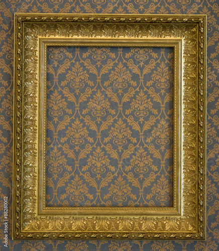 golden frame over grunge wallpaper