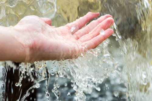 Woman's palm in water