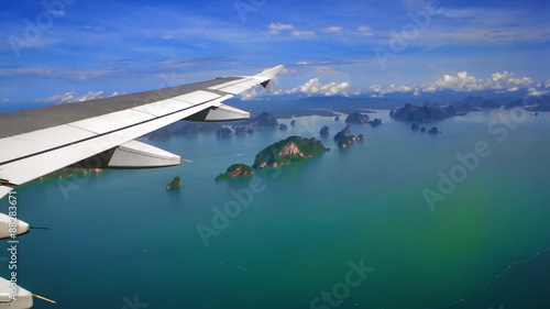 View from the airplane window to sparse islands in timelapse. FullHD 1080p.