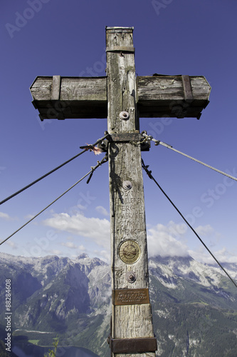 Gipfelkreuz am Jenner in Berchtesgaden mit Watzmann im Hintergrund photo