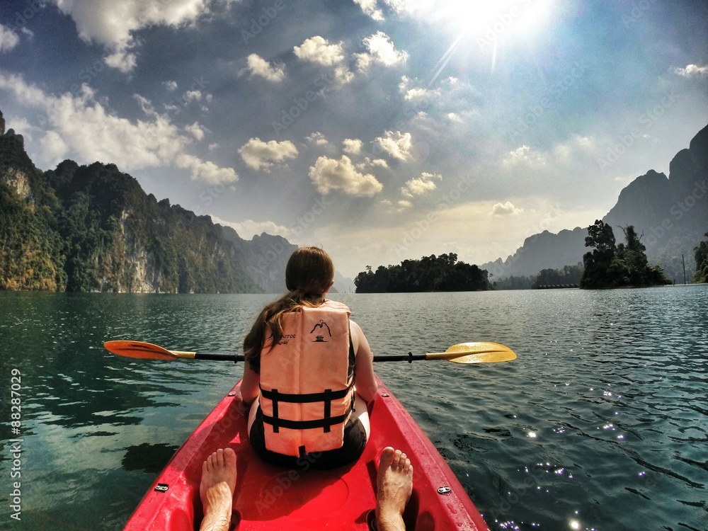 Kayaking on lake with friend