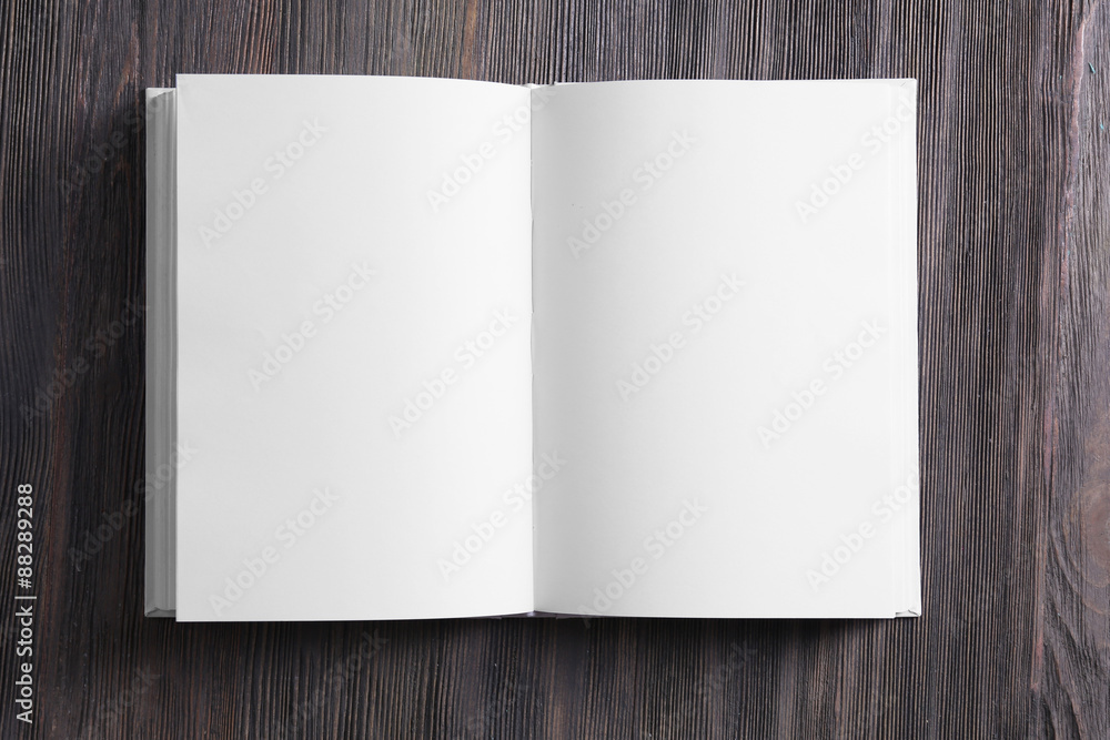 Blank book on wooden background Blank book on wooden background
