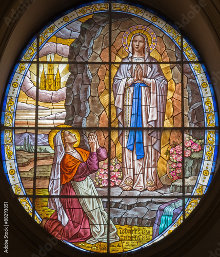 Rome - The windowpane of Virgin Mary of Lourdens