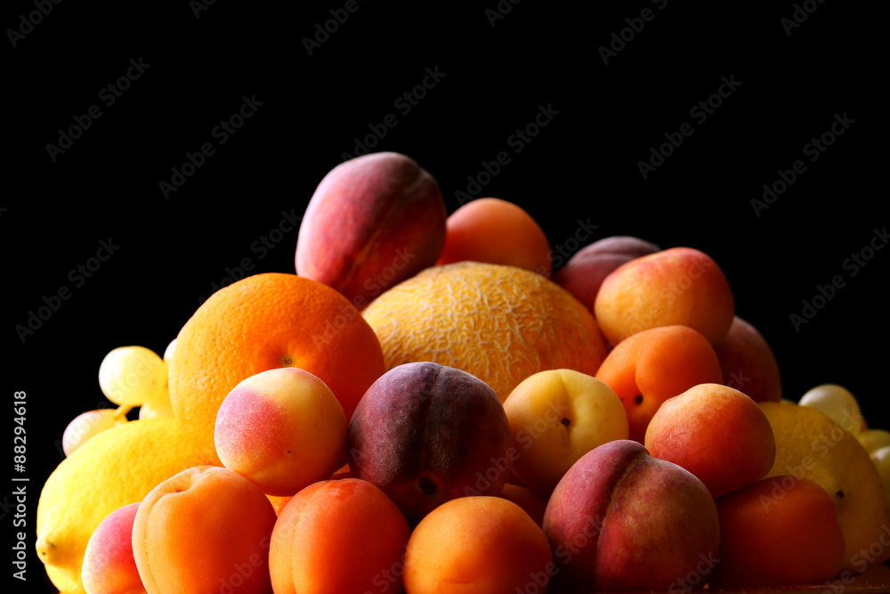 Heap of fresh fruits on dark background Heap of fresh fruits on dark background
