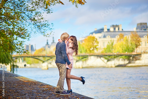 Young dating couple in Paris on a bright fall day © Ekaterina Pokrovsky
