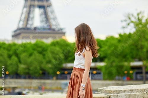 Girl in Paris on a sunny spring or autumn day
