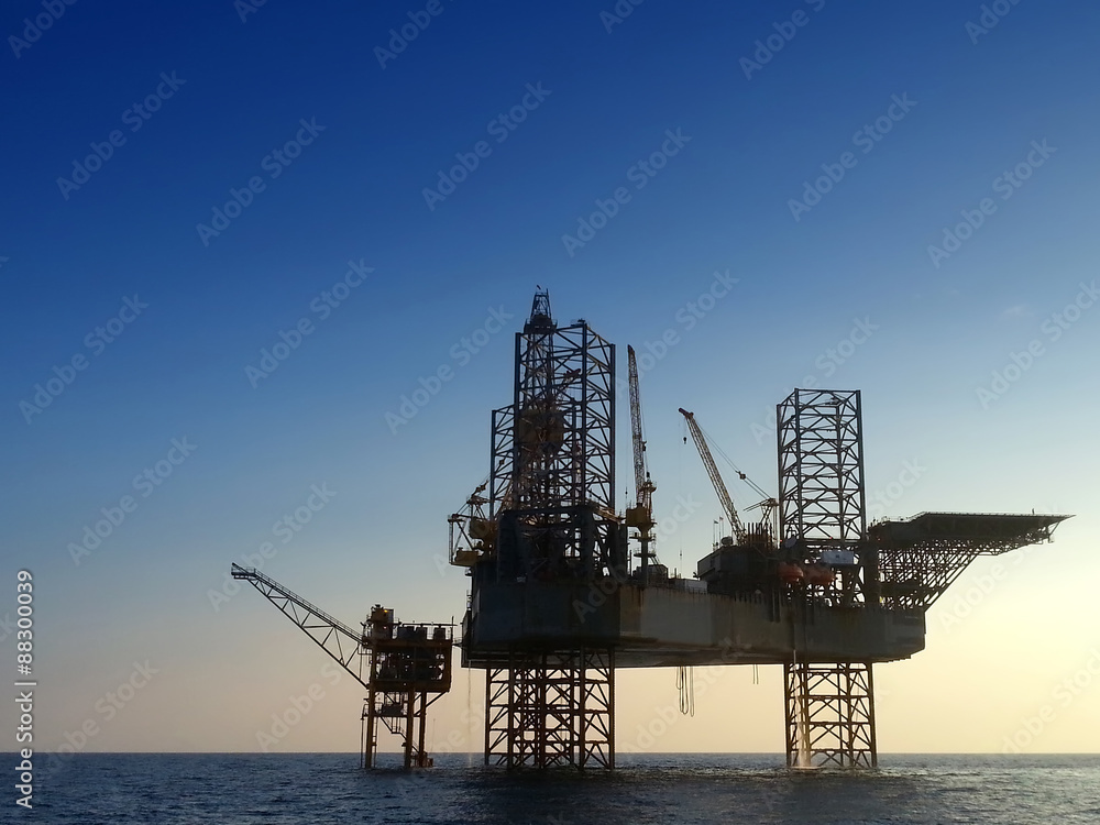 silhouette offshore oil rig drilling platform