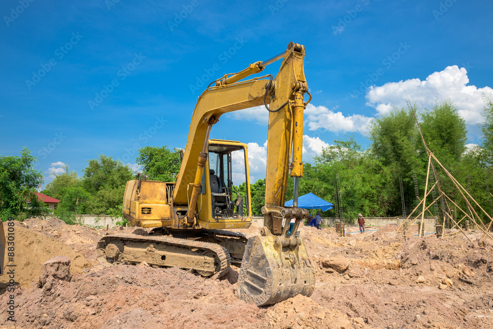 Excavator working at construction site Excavator working at construction site