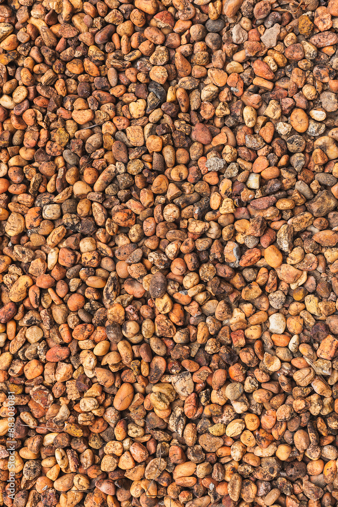 Orange tone decoration pebbles as a background. Orange tone decoration pebbles as a background.