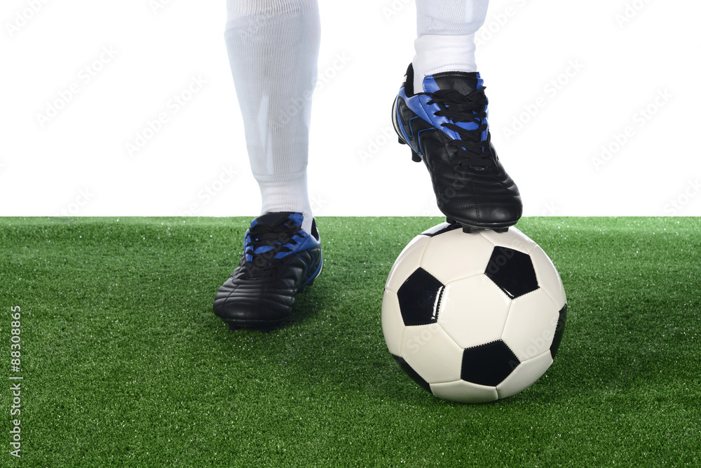 Obraz premium Pierna y balón de fútbol