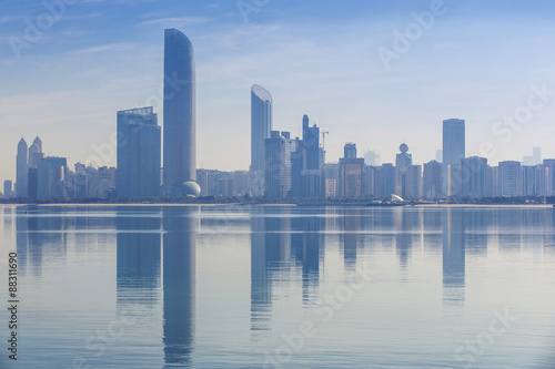 View of City skyline reflecting in Persian Gulf, Abu Dhabi photo