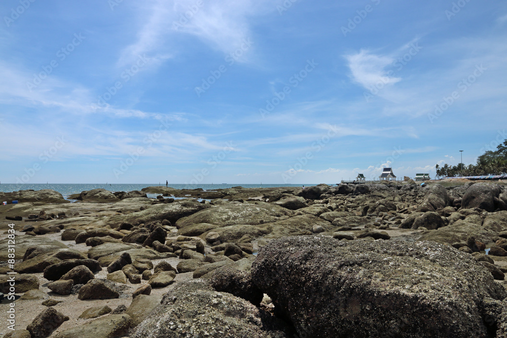 Stones on the beach under blue sky Stones on the beach under blue sky