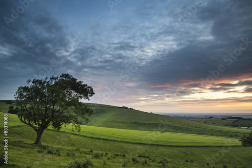 Beautiful Summer sunset landscape Steyning Bowl on South Downs