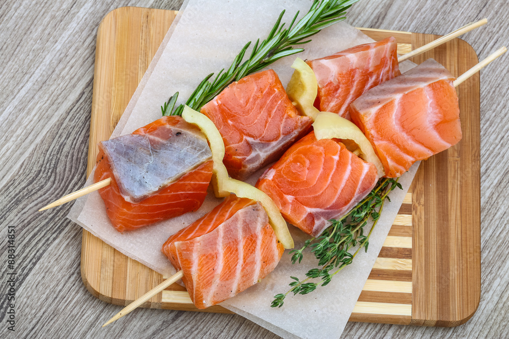 Raw salmon skewers