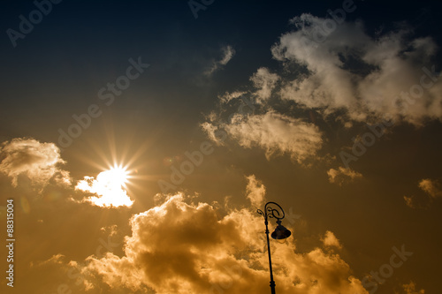Street lamp on the sky background