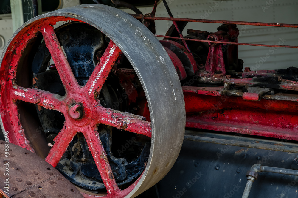 Old Red Wheel in Machinery