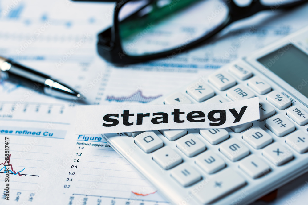 strategy concept with financial graphs and charts strategy concept with financial graphs and charts